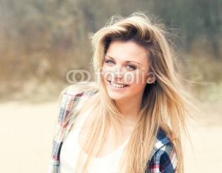 beautiful_girl_smiling_on_a_sunny_day.jpg