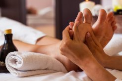 Massage-of-human-foot-in-spa-salon-Soft-focus.jpg
